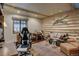 Inviting living room with log walls, wooden beams, comfortable seating, and natural light at 327 Peerless Dr, Breckenridge, CO 80424