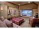 Comfortable media room with projector screen, plush seating, and movie memorabilia at 327 Peerless Dr, Breckenridge, CO 80424