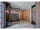 Mud room with tile floors, wooden bench, coat rack, storage cabinets, and natural light from door window at 327 Peerless Dr, Breckenridge, CO 80424