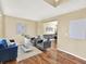 Cozy living room with hardwood floors and an open layout, perfect for entertaining at 8380 Blackgum St, Parker, CO 80134