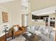 Comfortable living area showcasing hardwood floors, modern decor, and seamless flow to the kitchen at 8380 Blackgum St, Parker, CO 80134