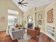Bright and airy living room with vaulted ceilings, fireplace, and hardwood floors at 8380 Blackgum St, Parker, CO 80134