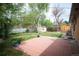 Brick back patio perfect for outdoor living and entertaining at 7987 Durango St, Denver, CO 80221