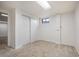 Bright basement bedroom with carpet, window and closet for ample storage and natural light at 7987 Durango St, Denver, CO 80221