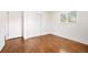 Bedroom with hardwood floors and a closet at 7987 Durango St, Denver, CO 80221