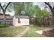 Backyard storage shed with garden bed, and plenty of yard space at 7987 Durango St, Denver, CO 80221