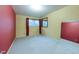 Bedroom with neutral carpet and wall with window allowing natural light to fill the room at 4140 Monroe Dr # C, Boulder, CO 80303