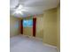 Well-lit bedroom features a ceiling fan, large window, and neutral colors, which provides a tranquil retreat at 4140 Monroe Dr # C, Boulder, CO 80303