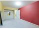 Bedroom featuring neutral carpet and access to a walk-in closet and an en-suite bathroom at 4140 Monroe Dr # C, Boulder, CO 80303