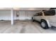 Interior view of a spacious garage featuring parking space for vehicles and storage at 4140 Monroe Dr # C, Boulder, CO 80303
