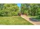 Scenic community green space with a walking path and a charming bridge at 4140 Monroe Dr # C, Boulder, CO 80303