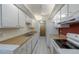 This kitchen includes ample cabinet space, a sink, and modern appliances that make cooking simple and efficient at 4140 Monroe Dr # C, Boulder, CO 80303