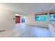 Bright living room featuring sleek flooring, a window with blinds, offering a versatile living space at 4140 Monroe Dr # C, Boulder, CO 80303