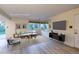 A virtually staged living room, showing a modern floor, furnishings, and decor to enhance the home's appeal at 4140 Monroe Dr # C, Boulder, CO 80303
