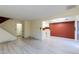 This living room displays durable flooring, stairs to the second story, and direct access to the adjacent kitchen at 4140 Monroe Dr # C, Boulder, CO 80303