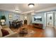 Finished basement featuring a cozy seating area, dining area, and stylish decor at 3150 W Mexico Ave, Denver, CO 80219