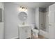 Bathroom features a single vanity, decorative lighting, and a shower/tub combo at 7440 S Blackhawk St # 207, Englewood, CO 80112