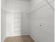 Walk-in closet with wire shelving for easy storage at 7440 S Blackhawk St # 207, Englewood, CO 80112