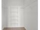 Walk-in closet features wire shelving for optimal storage and organization at 7440 S Blackhawk St # 207, Englewood, CO 80112