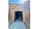 Welcoming stone entrance with a staircase, creating an inviting first impression of the property at 7440 S Blackhawk St # 207, Englewood, CO 80112