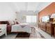 Bright bedroom with terracotta wall and window coverings at 7877 E Mississippi Ave # 604, Denver, CO 80247