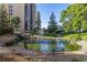 Peaceful pond with fountain, offering a tranquil outdoor setting at 7877 E Mississippi Ave # 604, Denver, CO 80247