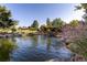 Relaxing pond and waterfall, surrounded by lush landscaping at 7877 E Mississippi Ave # 604, Denver, CO 80247