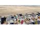 Aerial view of a neighborhood with houses and solar panels at 3158 S Nepal Way, Aurora, CO 80013