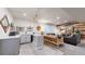 Basement wet bar with granite countertop and gray cabinets at 3158 S Nepal Way, Aurora, CO 80013