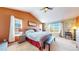 Bright bedroom with a king-size bed and large windows at 3158 S Nepal Way, Aurora, CO 80013