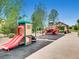 Community playground with playset and shaded area at 3158 S Nepal Way, Aurora, CO 80013