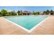 Community swimming pool with a large deck and lounge chairs at 3158 S Nepal Way, Aurora, CO 80013