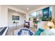 Cozy sitting area with a piano and built-in shelving at 3158 S Nepal Way, Aurora, CO 80013