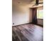 Bedroom featuring hardwood floors, a ceiling fan, and a window with natural light at 4860 E 120Th Pl, Thornton, CO 80241