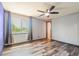 Bedroom featuring luxury vinyl plank flooring and a ceiling fan at 4860 E 120Th Pl, Thornton, CO 80241