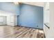 Bright and airy living space featuring soaring ceilings, wood-look floors and natural light at 4860 E 120Th Pl, Thornton, CO 80241