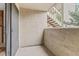 Spacious outdoor balcony with a view of lush greenery and stairs leading to another level at 20 S Boulder Cir # 2109, Boulder, CO 80303