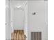 Hallway featuring wood-look flooring and access to bedrooms and closets at 20 S Boulder Cir # 2109, Boulder, CO 80303