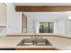 Kitchen pass-through featuring stainless steel appliances and breakfast bar at 20 S Boulder Cir # 2109, Boulder, CO 80303