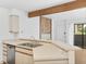 Kitchen pass-through featuring stainless steel appliances and eat-in breakfast bar at 20 S Boulder Cir # 2109, Boulder, CO 80303
