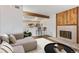 Living room featuring stylish furnishings and a view to the kitchen and a fireplace at 20 S Boulder Cir # 2109, Boulder, CO 80303