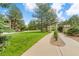 A lush green lawn extends along the walking path at 20 S Boulder Cir # 2109, Boulder, CO 80303
