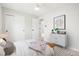Bedroom with ample closet space, bright decor, and soft natural light from the window at 13202 Olmsted Pl, Denver, CO 80239