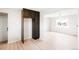 Open layout with modern built-in storage solutions connecting the living space at 13202 Olmsted Pl, Denver, CO 80239