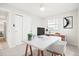 Home office features a large desk, ample storage, and a modern aesthetic at 13202 Olmsted Pl, Denver, CO 80239
