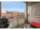 Balcony view overlooking the baseball stadium with a grill and outdoor furniture, perfect for game days and enjoying outdoor living at 2229 Blake St # 505, Denver, CO 80205