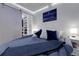 Modern bedroom with ambient lighting and closet space at 2229 Blake St # 505, Denver, CO 80205