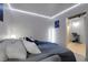Primary bedroom with ambient lighting and ensuite bathroom at 2229 Blake St # 505, Denver, CO 80205