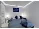 Modern bedroom with ambient lighting and a view of the closet at 2229 Blake St # 505, Denver, CO 80205