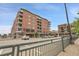 Apartment building with reserved parking and proximity to local shops and amenities at 2229 Blake St # 505, Denver, CO 80205
